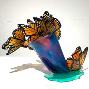 Resin sculpture vase with monarch butterflies